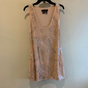 Gorgeous party dress in soft pink with embroidery and hardware details